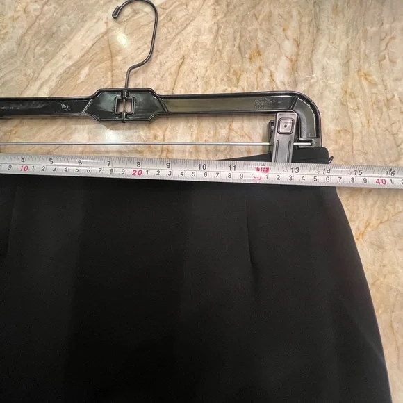 Chic Black Midi Skirt with Embellished Hem